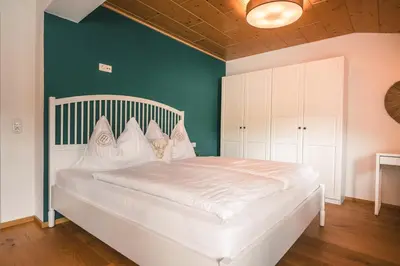 Ein Bett oder Betten in einem Zimmer der Unterkunft casa wii