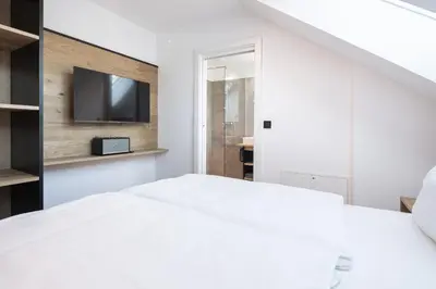 Ein Bett oder Betten in einem Zimmer der Unterkunft Moxn Apartment Lungau - Small Penthouse mit Terrasse