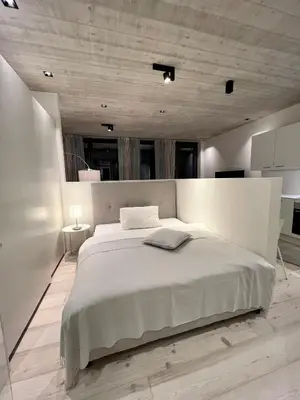 Ein Bett oder Betten in einem Zimmer der Unterkunft Ferienwohnung Tennengau mit Parkplatz