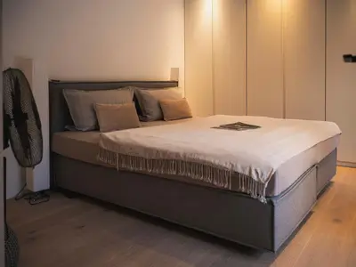 Ein Bett oder Betten in einem Zimmer der Unterkunft Ferienwohnung Tennengau mit Parkplatz