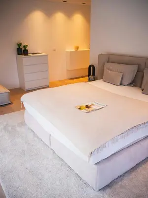 Ein Bett oder Betten in einem Zimmer der Unterkunft Ferienwohnung Tennengau mit Parkplatz