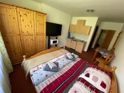 Ein Bett oder Betten in einem Zimmer der Unterkunft Dachsteinblick apartment