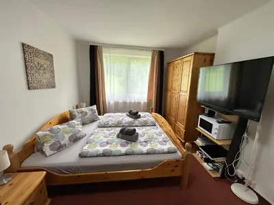 Ein Bett oder Betten in einem Zimmer der Unterkunft Dachsteinblick apartment