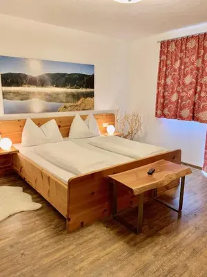 Ein Bett oder Betten in einem Zimmer der Unterkunft AlpenChalet Mitterberg