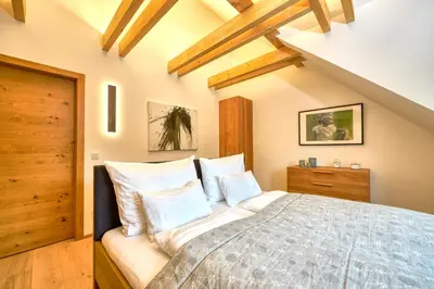 Ein Bett oder Betten in einem Zimmer der Unterkunft Seechalet Traunsee