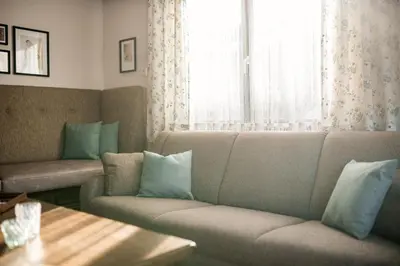 Ein Sitzbereich in der Unterkunft M-House FLACHAU Ganzes Haus für 8 Personen