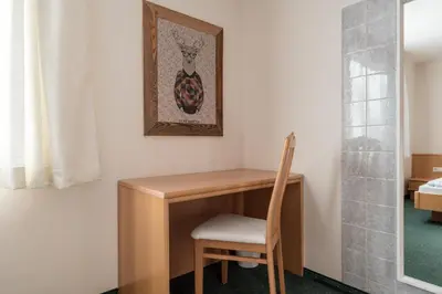 Ein Bett oder Betten in einem Zimmer der Unterkunft M-House FLACHAU Ganzes Haus für 8 Personen