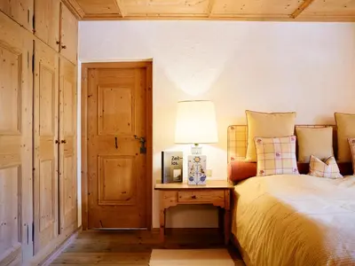 Ein Bett oder Betten in einem Zimmer der Unterkunft TAUROA Winterstellgut