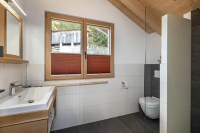 Ein Badezimmer in der Unterkunft Holzlodge Chalets Nähe Obertauern