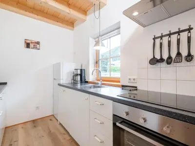 Küche/Küchenzeile in der Unterkunft Wolfgangchalet A
