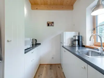 Küche/Küchenzeile in der Unterkunft Wolfgangchalet A