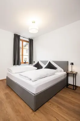 Ein Bett oder Betten in einem Zimmer der Unterkunft Centro 7 - Kristall Lungau