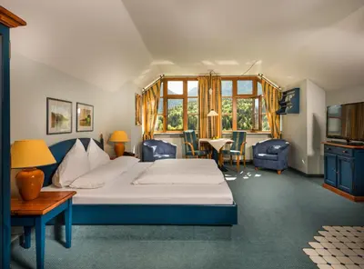 Ein Bett oder Betten in einem Zimmer der Unterkunft MONDI Appartements am Grundlsee