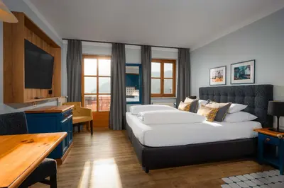 Ein Bett oder Betten in einem Zimmer der Unterkunft MONDI Appartements am Grundlsee