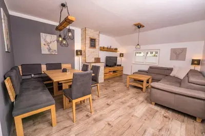 Ein Sitzbereich in der Unterkunft Ferienwohnung Andexlinger
