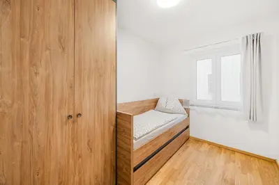 Ein Bett oder Betten in einem Zimmer der Unterkunft Hallstatt Lakeside Top 2 - Zimmer mit Gartenzugang