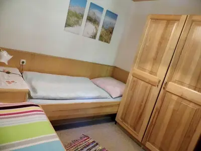 Ein Bett oder Betten in einem Zimmer der Unterkunft Biohof Schwanser