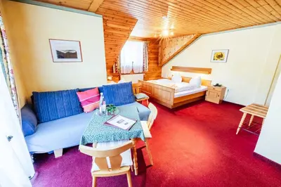 Ein Bett oder Betten in einem Zimmer der Unterkunft Landgasthof Zum Hammerschmied
