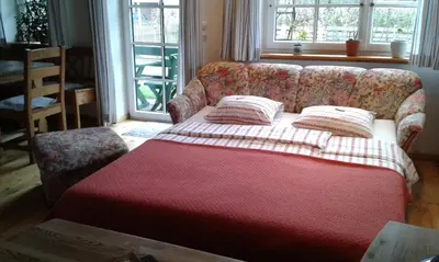 Ein Bett oder Betten in einem Zimmer der Unterkunft Ferienwohnung Am Pflanzgarten