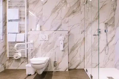 Ein Badezimmer in der Unterkunft Hotel Traunfall