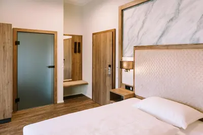 Ein Bett oder Betten in einem Zimmer der Unterkunft Hotel Traunfall