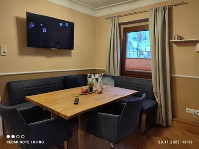 Ein Sitzbereich in der Unterkunft Appartement Vorstadtstub'n
