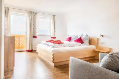 Ein Bett oder Betten in einem Zimmer der Unterkunft Ferienhaus Weitblick