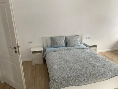 Ein Bett oder Betten in einem Zimmer der Unterkunft Center House
