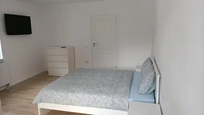 Ein Bett oder Betten in einem Zimmer der Unterkunft Center House