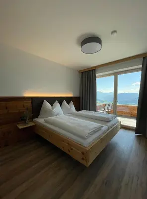 Ein Bett oder Betten in einem Zimmer der Unterkunft Der Wenger