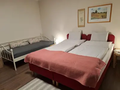 Ein Bett oder Betten in einem Zimmer der Unterkunft Haus Margrit Ferienwohnung in Sonnenlage