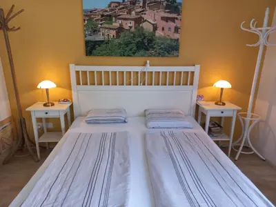 Ein Bett oder Betten in einem Zimmer der Unterkunft Haus mit mediterranem Flair