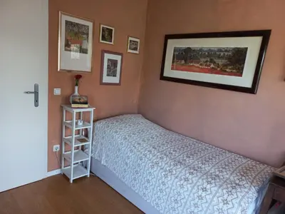 Ein Bett oder Betten in einem Zimmer der Unterkunft Haus mit mediterranem Flair