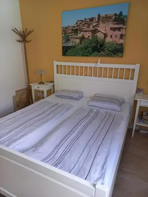 Ein Bett oder Betten in einem Zimmer der Unterkunft Haus mit mediterranem Flair