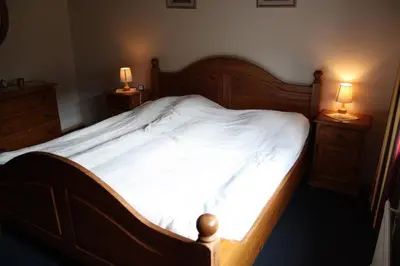 Ein Bett oder Betten in einem Zimmer der Unterkunft Haus ter Stege