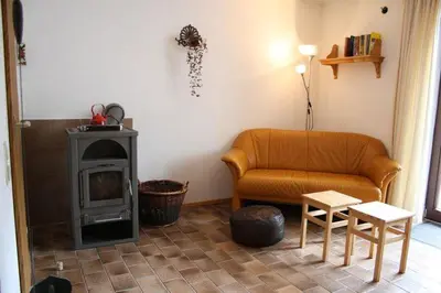 Ein Sitzbereich in der Unterkunft Haus ter Stege