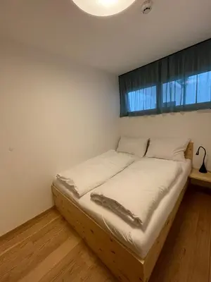 Ein Bett oder Betten in einem Zimmer der Unterkunft Planai Apartment Eishöhle