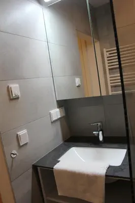 Ein Badezimmer in der Unterkunft Planai Apartment Eishöhle