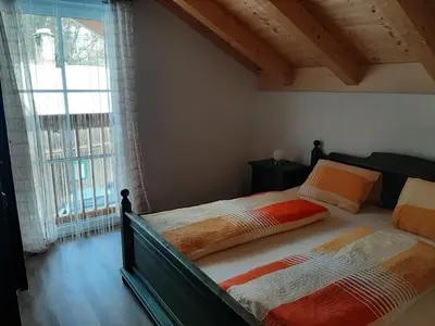 Ein Bett oder Betten in einem Zimmer der Unterkunft Ferienwohnung Leni