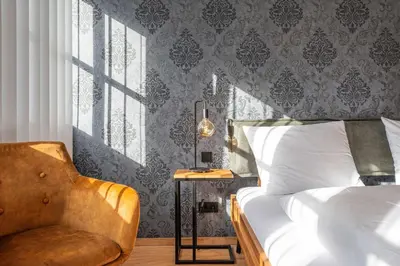 Ein Bett oder Betten in einem Zimmer der Unterkunft Apartment am Grundlsee - Your Austrian Home