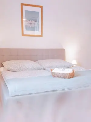 Ein Bett oder Betten in einem Zimmer der Unterkunft Apartment Haus Toplitzsee nahe dem Grundlsee und Toplitzsee