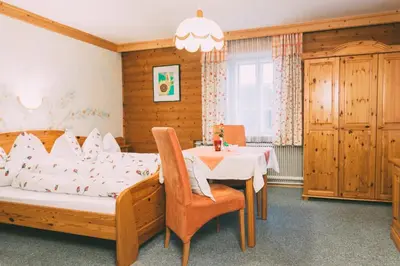 Ein Bett oder Betten in einem Zimmer der Unterkunft Pichlerhof Sommmercard - Urlaub am Bauernhof