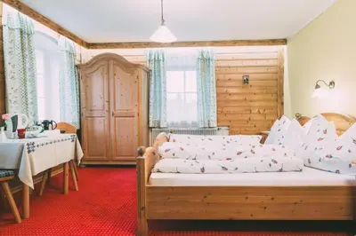 Ein Bett oder Betten in einem Zimmer der Unterkunft Pichlerhof Sommmercard - Urlaub am Bauernhof