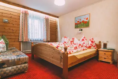 Ein Bett oder Betten in einem Zimmer der Unterkunft Pichlerhof Sommmercard - Urlaub am Bauernhof