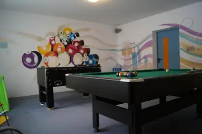 Ein Billardtisch in der Unterkunft Zeffererhof