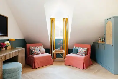 Ein Sitzbereich in der Unterkunft Villa Alma - a lakeside Boutique Hotel