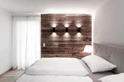 Ein Bett oder Betten in einem Zimmer der Unterkunft Planai Penthouse Royal