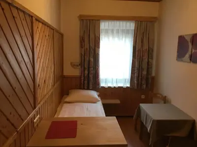 Ein Bett oder Betten in einem Zimmer der Unterkunft Ferienwohnungen Aigner