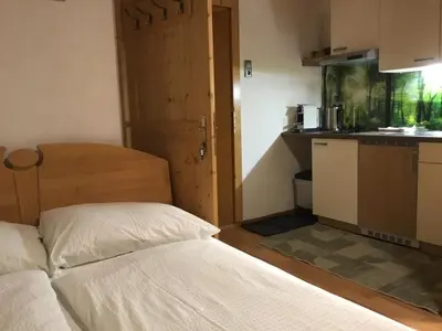 Ein Bett oder Betten in einem Zimmer der Unterkunft Ferienwohnungen Aigner