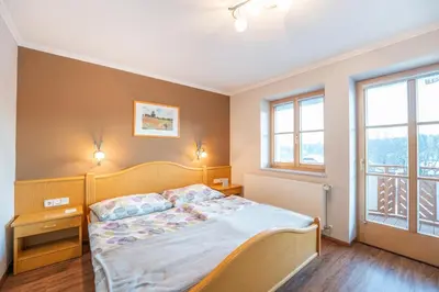 Ein Bett oder Betten in einem Zimmer der Unterkunft Haus Holzer